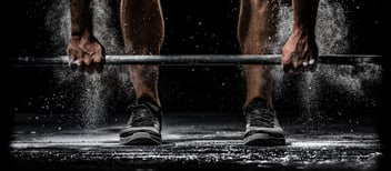 weightlifting a bar 